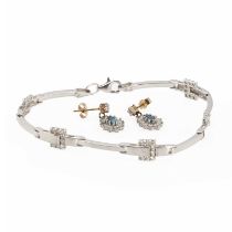 A 9ct white gold bracelet and a pair of blue topaz earrings,