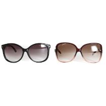 A pair of Gucci brown framed sunglasses,