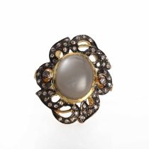 A silver moonstone and rose cut diamond cluster ring,