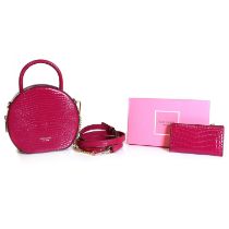 A Kate Spade berry blitz crocodile embossed circular bag,