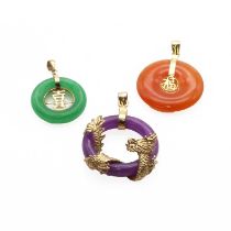 Three gold hardstone pendants,