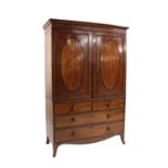 A Regency mahogany and calamader linen press