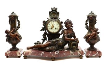 A spelter clock garniture