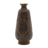 A brass, silver and copper Mamluk-style Islamic vase