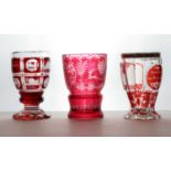 A group of three flashed Bohemian glass spa beakers