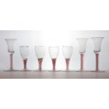 A group of seven colour air twist stem glasses,