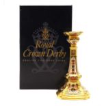 A Royal Crown Derby porcelain candlestick