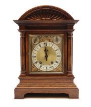 An oak cased eight-day bracket clock