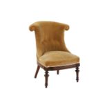 A Victorian walnut nursing chair,