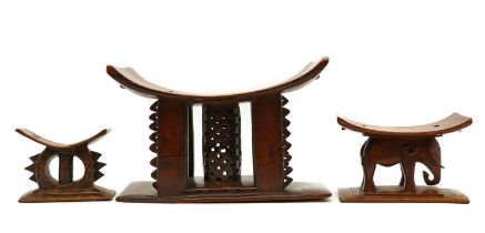 A group of three African hardwood stools,