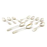 A collection of ten fiddle pattern silver soup spoons,