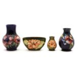 A group of four Moorcroft pottery vases,