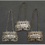 A group of three William IV silver decanter labels