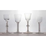 A group of four 18th century opaque twist wine glasses