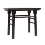 A Chinese black lacquered side table,