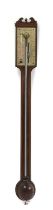 A mahogany stick barometer