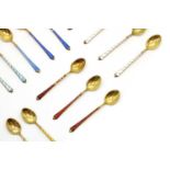 A collection of sixteen Danish gilt sterling silver teaspoons,