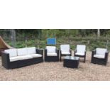 A rattan garden furniture set,