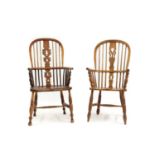 A near pair of elm Windsor chairs