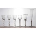 A set of three 18th century facet cut wine glasses