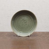 A Chinese celadon-glazed saucer,