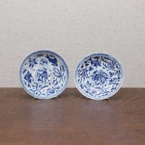 A pair of Chinese blue and white saucers,