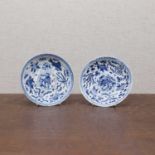 A pair of Chinese blue and white saucers,