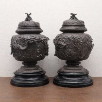 A pair of Japanese bronze jars and covers,