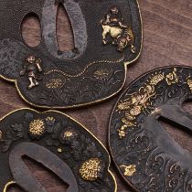 Three Japanese gilt-bronze tsuba,