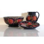Three Moorcroft pottery 'Pomegranate' items,