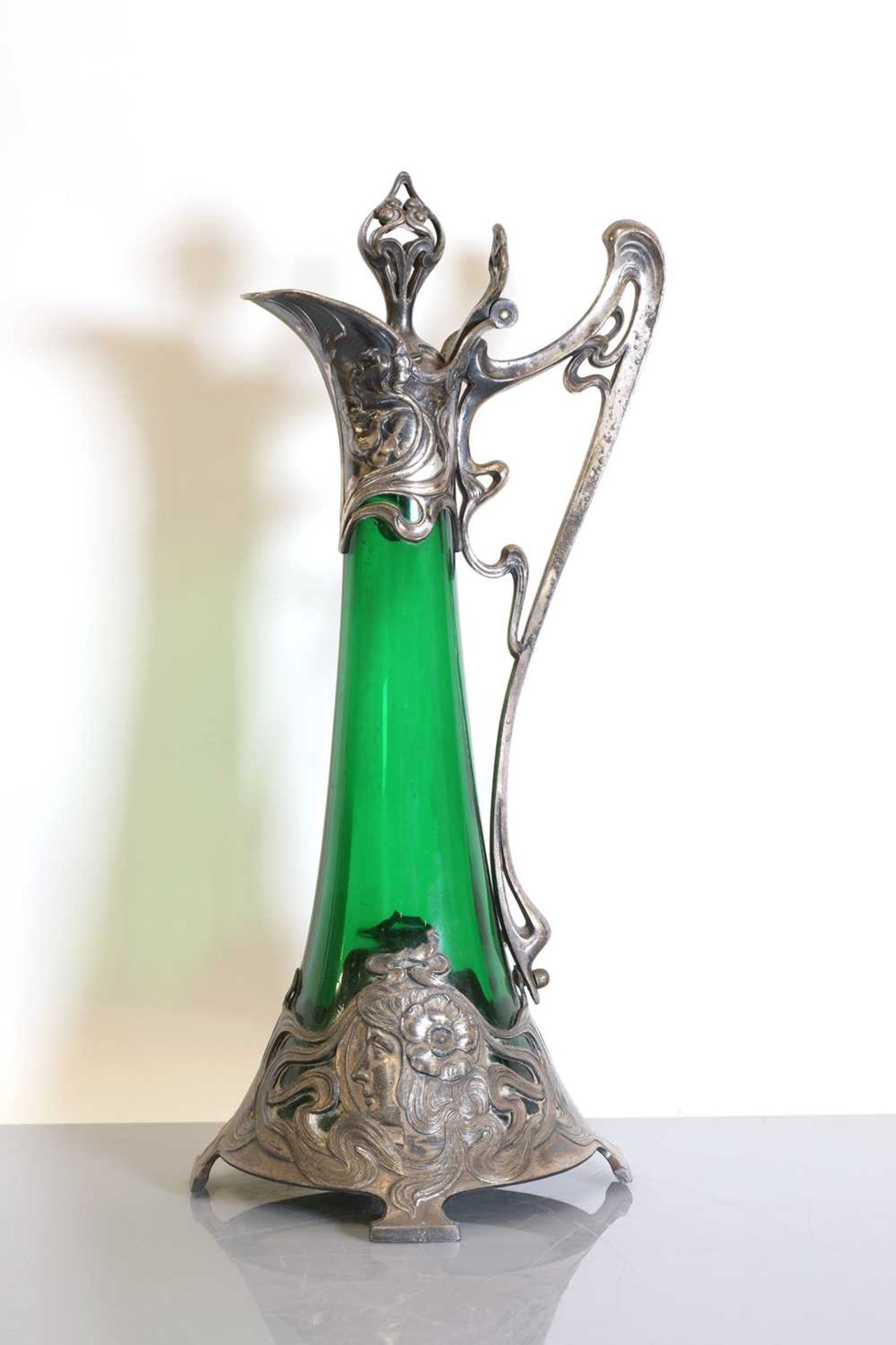 An Art Nouveau WMF claret jug and stopper,