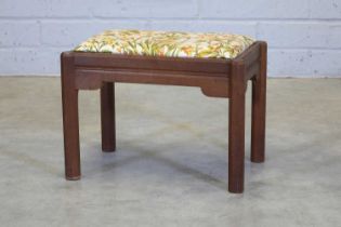 A Gordon Russell walnut stool,