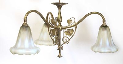 A brass three-branch ceiling light,