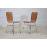 A pair of 'Toby' stacking chairs,