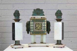 A French Art Deco bronze-mounted onyx clock garniture,