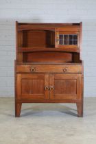 A Liberty & Co. walnut bookcase,