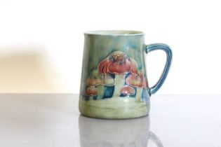 A Liberty & Co. Moorcroft 'Claremont' pottery christening mug,