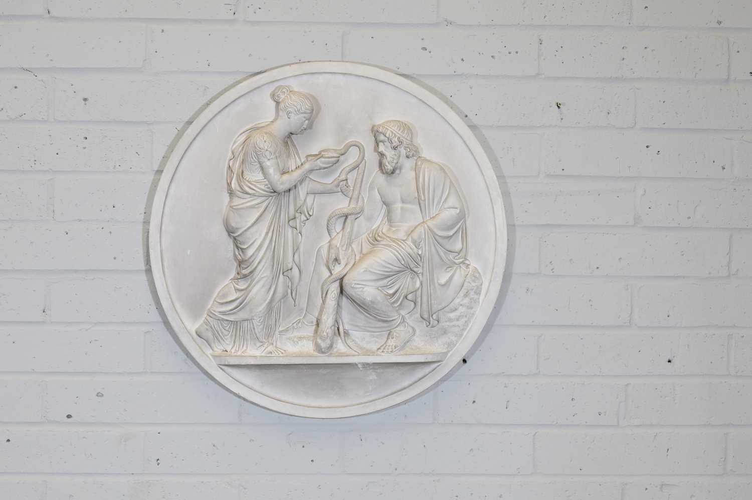 A modern plaster wall plaque,