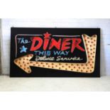 A 1950s-style neon diner sign,