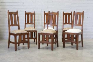 A set of six Arts and Crafts oak chairs,