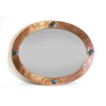An Arts and Crafts copper mirror,