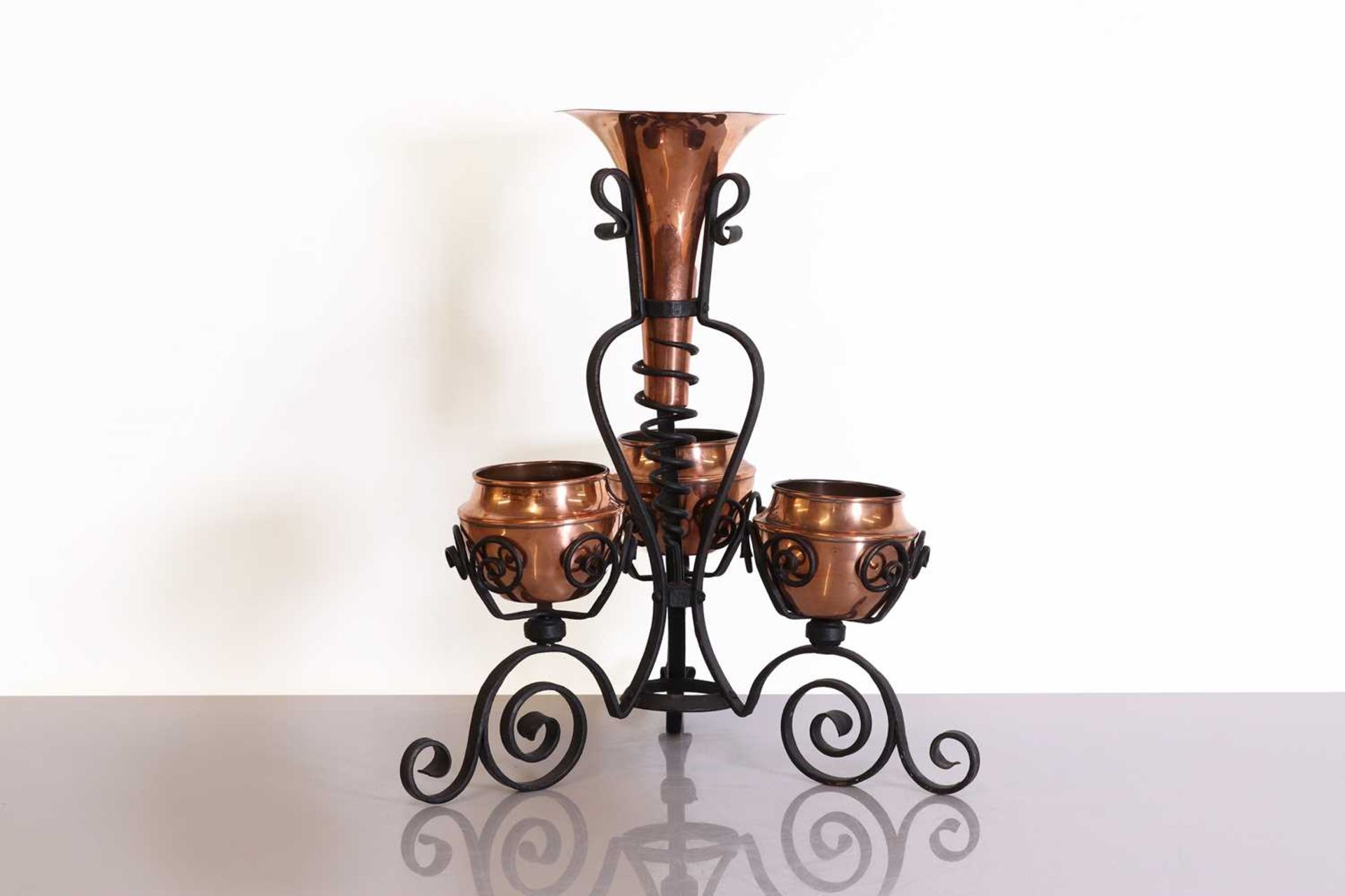 An Arts and Crafts copper and wrought-iron centrepiece,