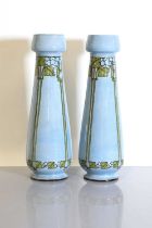 A pair of Doulton Lambeth faience pottery vases,