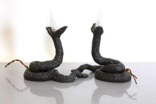A pair of French patinated bronze serpent table lamps,