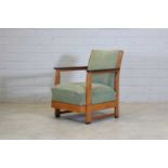 An Art Deco oak and coromandel lounge armchair,