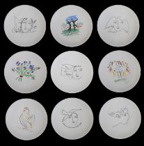 A group of nine Limoges porcelain plates,