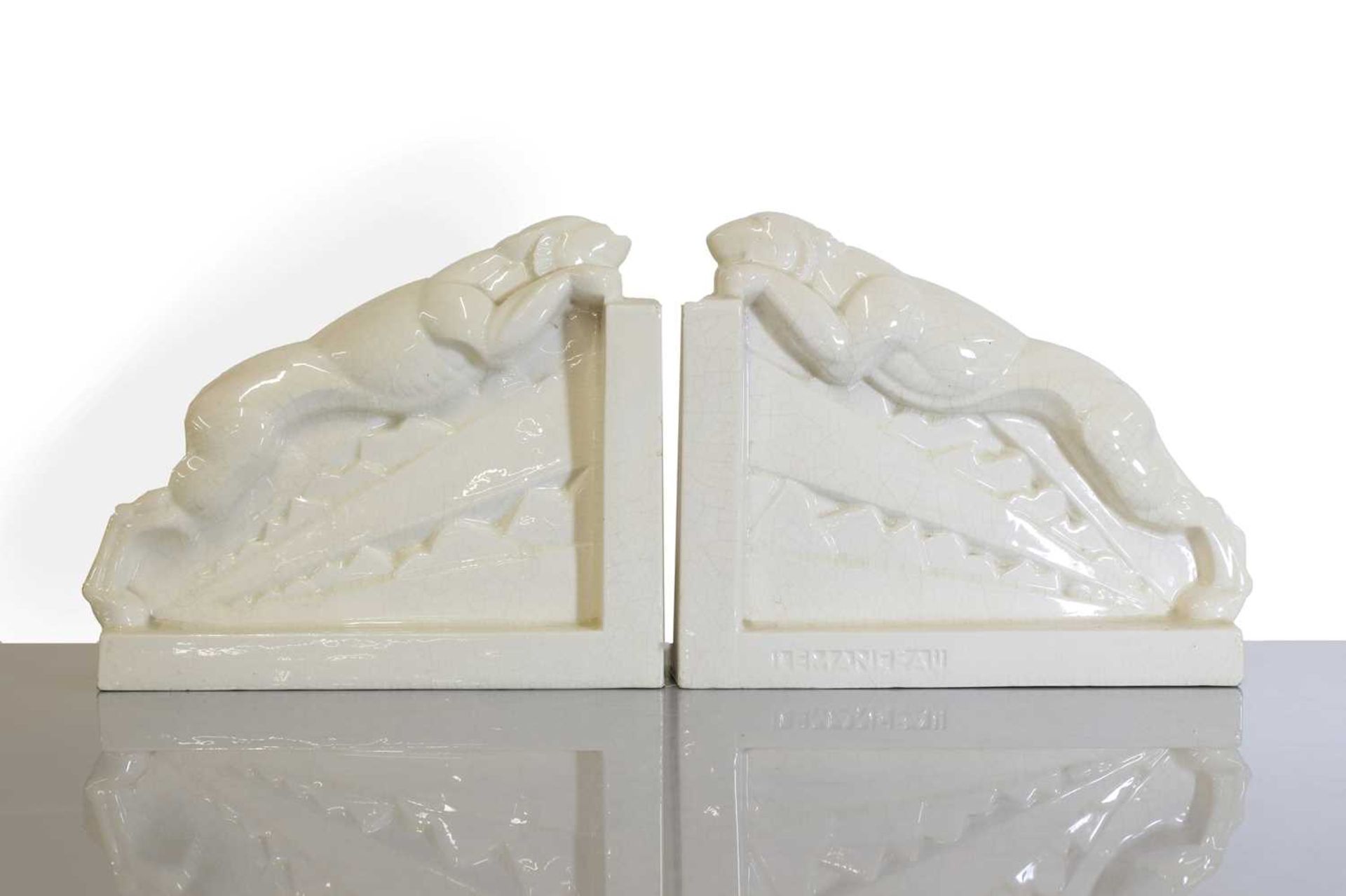 A pair of French Art Deco ceramic bookends,