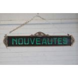 A French Art Nouveau 'Nouveautés' sign,