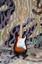 A 1989 Fender Stratocaster electric guitar,