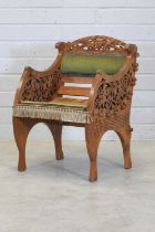 A Gothic Revival satin walnut armchair,